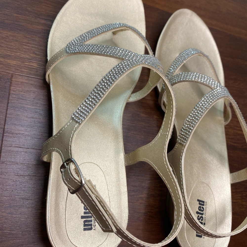 Gold colored sandals with bling